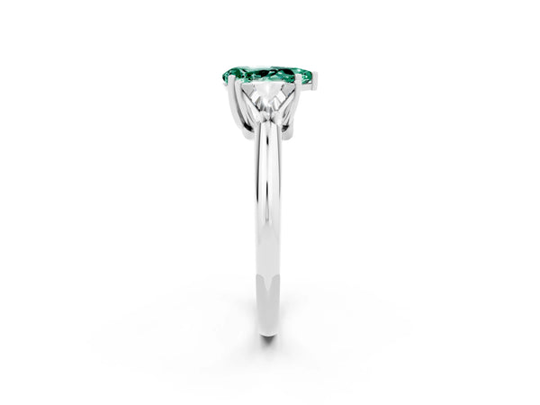 Platinum Three-Stone Pear Cut Green Sapphire Engagement Ring with Trillion Side Stones and Prong Setting