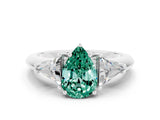 White gold Three-Stone Pear Cut Cut Diamond Ring with Trillion Side Stones and Four-Prong Setting
