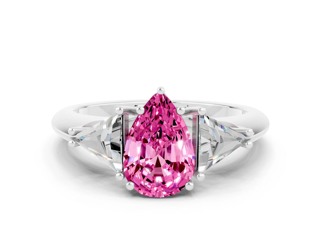 White gold Three-Stone Pear Cut Cut Diamond Ring with Trillion Side Stones and Four-Prong Setting