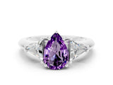 White gold Three-Stone Pear Cut Cut Diamond Ring with Trillion Side Stones and Four-Prong Setting