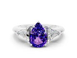 White gold Three-Stone Pear Cut Cut Diamond Ring with Trillion Side Stones and Four-Prong Setting