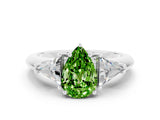 White gold Three-Stone Pear Cut Cut Diamond Ring with Trillion Side Stones and Four-Prong Setting