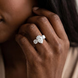 White gold Three-Stone Pear Cut Diamond Engagement Ring with Prong Setting on a White Gold Band_20
