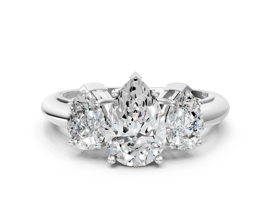 White gold Three-Stone Pear Cut Diamond Engagement Ring with Prong Setting on a White Gold Band_50