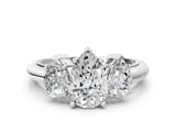 White gold Three-Stone Pear Cut Diamond Engagement Ring with Prong Setting on a White Gold Band_50