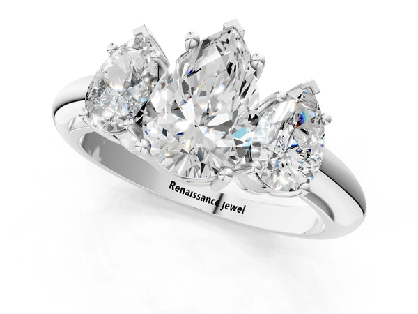 White gold Three-Stone Pear Cut Diamond Engagement Ring with Prong Setting on a White Gold Band
