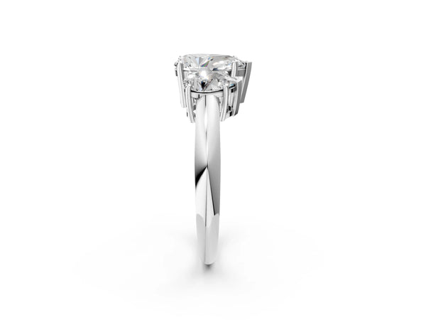 White gold Three-Stone Pear Cut Diamond Engagement Ring with Prong Setting on a White Gold Band