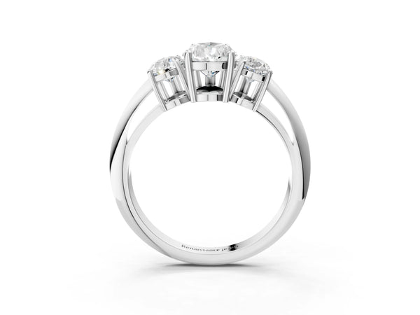 White gold Three-Stone Pear Cut Diamond Engagement Ring with Prong Setting on a White Gold Band