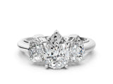 White gold Three-Stone Pear Cut Diamond Engagement Ring with Prong Setting on a White Gold Band_6