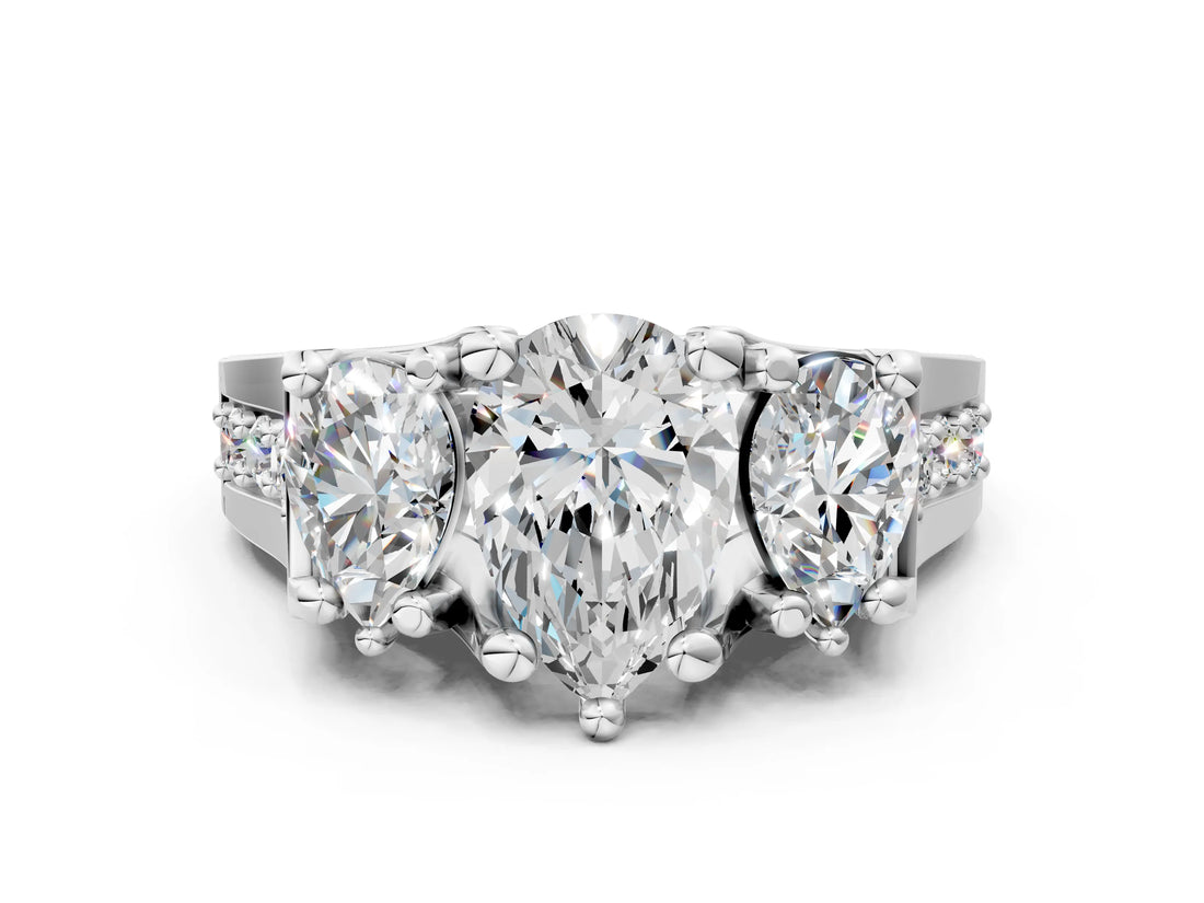 White gold Three-Stone Pear Cut Diamond Ring with Channel-Set Band and Four-Prong Setting_47