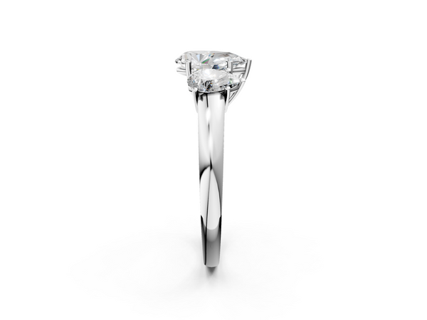 White gold Pear Cut Diamond Three-Stone Ring with Four-Prong Setting and Classic Band