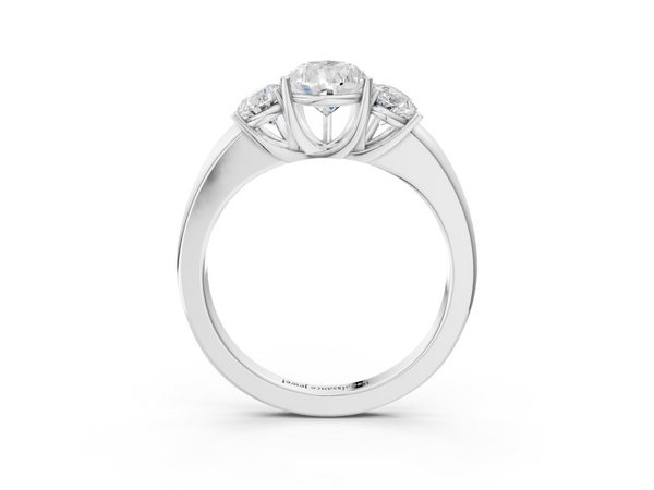 White gold Pear Cut Diamond Three-Stone Ring with Four-Prong Setting and Classic Band