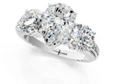 White gold Three-Stone Pear Cut Diamond Ring with Channel-Set Band and Prong Setting_7