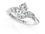 White gold Three-Stone Pear Cut Diamond Ring with Pear  Side Stones in Four-Prong Setting_53