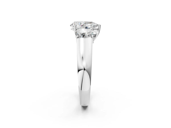 White gold Three-Stone Pear Cut Diamond Ring with Prong Setting and Classic Band