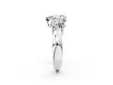 White gold Three-Stone Pear Cut Diamond Ring with Round Side Stones, Classic Band, and Four-Prong Setting_9