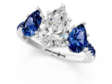 White gold Three-Stone Pear Cut Diamond Ring with Round with Blue Sapphire side stone Pavé Band and Prong Setting_13