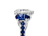 White gold Three-Stone Pear Cut Diamond Ring with Round with Blue Sapphire side stone Pavé Band and Prong Setting_17
