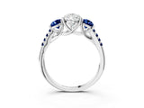 White gold Three-Stone Pear Cut Diamond Ring with Round with Blue Sapphire side stone Pavé Band and Prong Setting_3