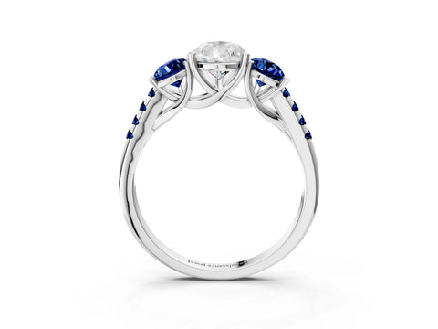 White gold Three-Stone Pear Cut Diamond Ring with Round with Blue Sapphire side stone Pavé Band and Prong Setting_3