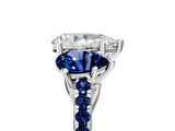 White gold Three-Stone Pear Cut Diamond Ring with Round with Blue Sapphire side stone Pavé Band and Prong Setting_5