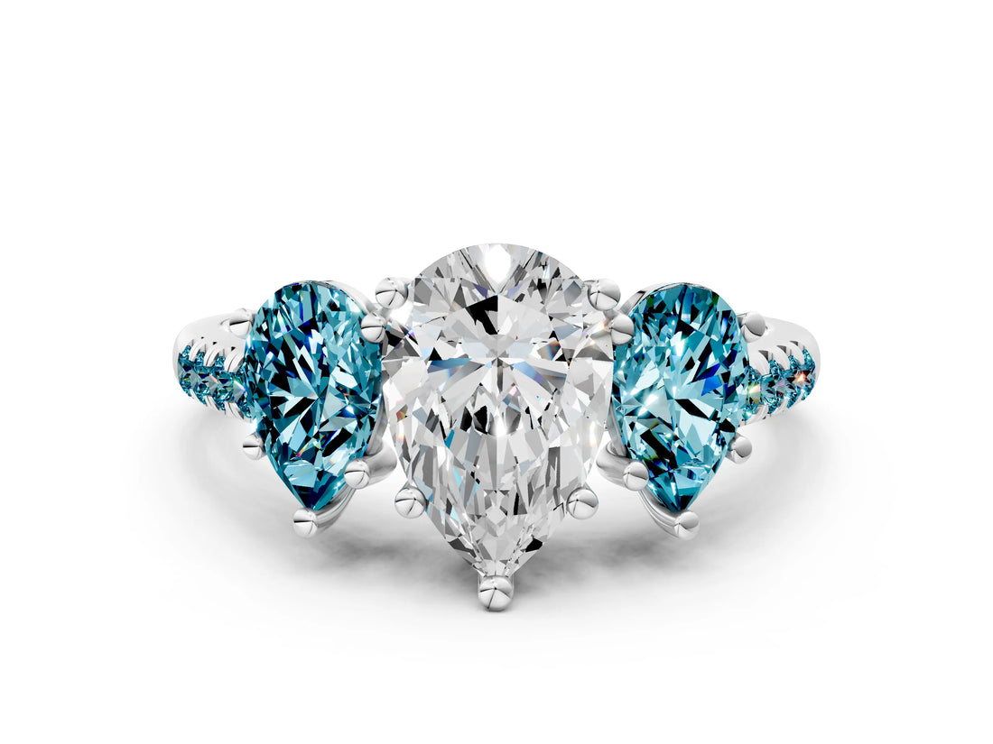 White gold Three-Stone Pear Cut Diamond Ring with Round with Blue Topaz side stone Pavé Band and Prong Setting_12