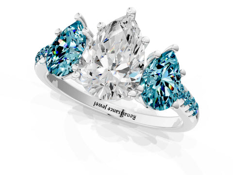 White gold Three-Stone Pear Cut Diamond Ring with Round with Blue Topaz side stone Pavé Band and Prong Setting_1
