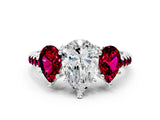 White gold Three-Stone Pear Cut Diamond Ring with Round with Garnet side stone Pavé Band and Prong Setting