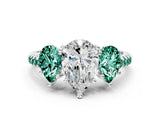White gold Three-Stone Pear Cut Diamond Ring with Round with Green Sapphire side stone Pavé Band and Prong Setting