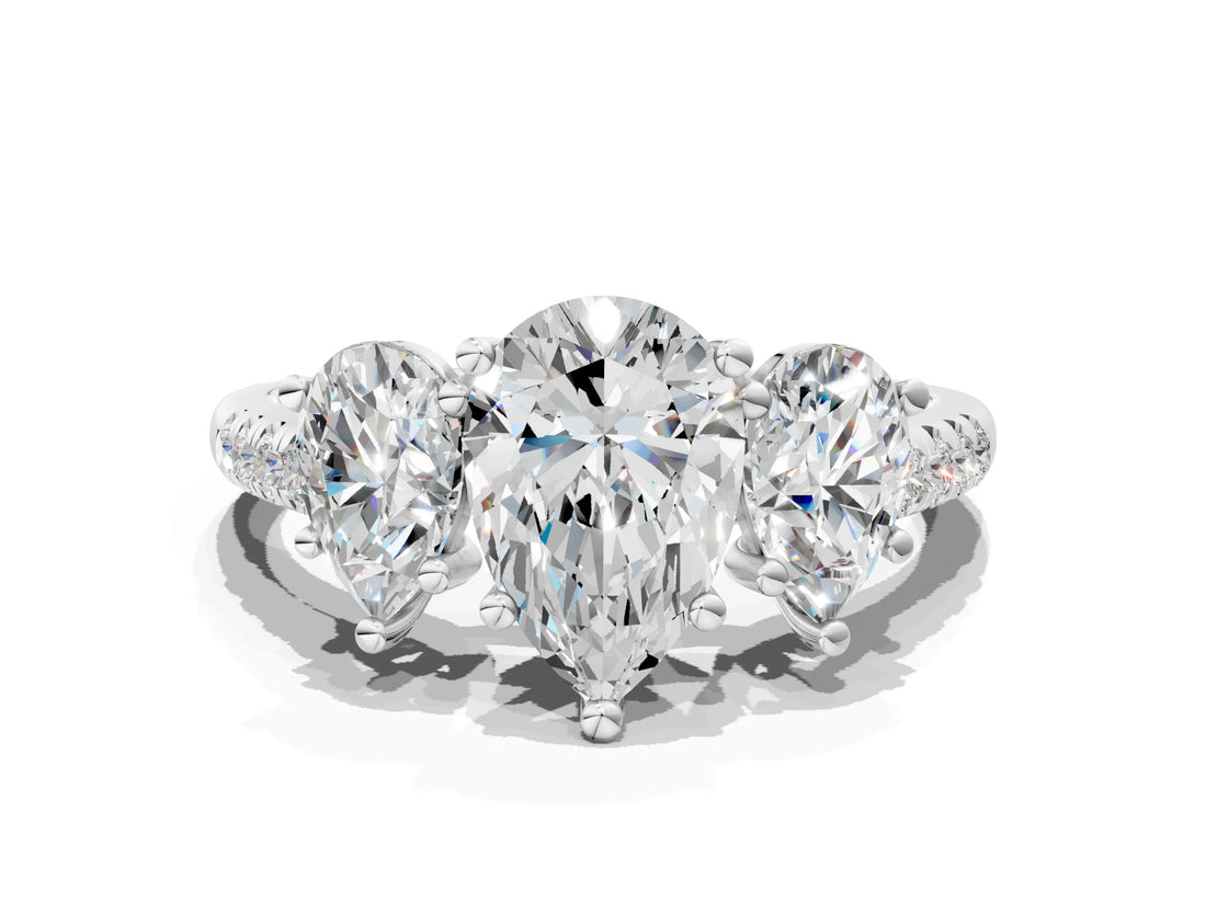 White gold Three-Stone Pear Cut Diamond Ring with Round with Moissanite side stone Pavé Band and Prong Setting