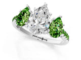 White gold Three-Stone Pear Cut Diamond Ring with Round with Peridot side stone Pavé Band and Prong Setting_13