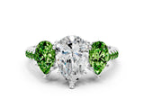 White gold Three-Stone Pear Cut Diamond Ring with Round with Peridot side stone Pavé Band and Prong Setting