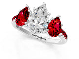 White gold Three-Stone Pear Cut Diamond Ring with Round with Ruby side stone Pavé Band and Prong Setting_1