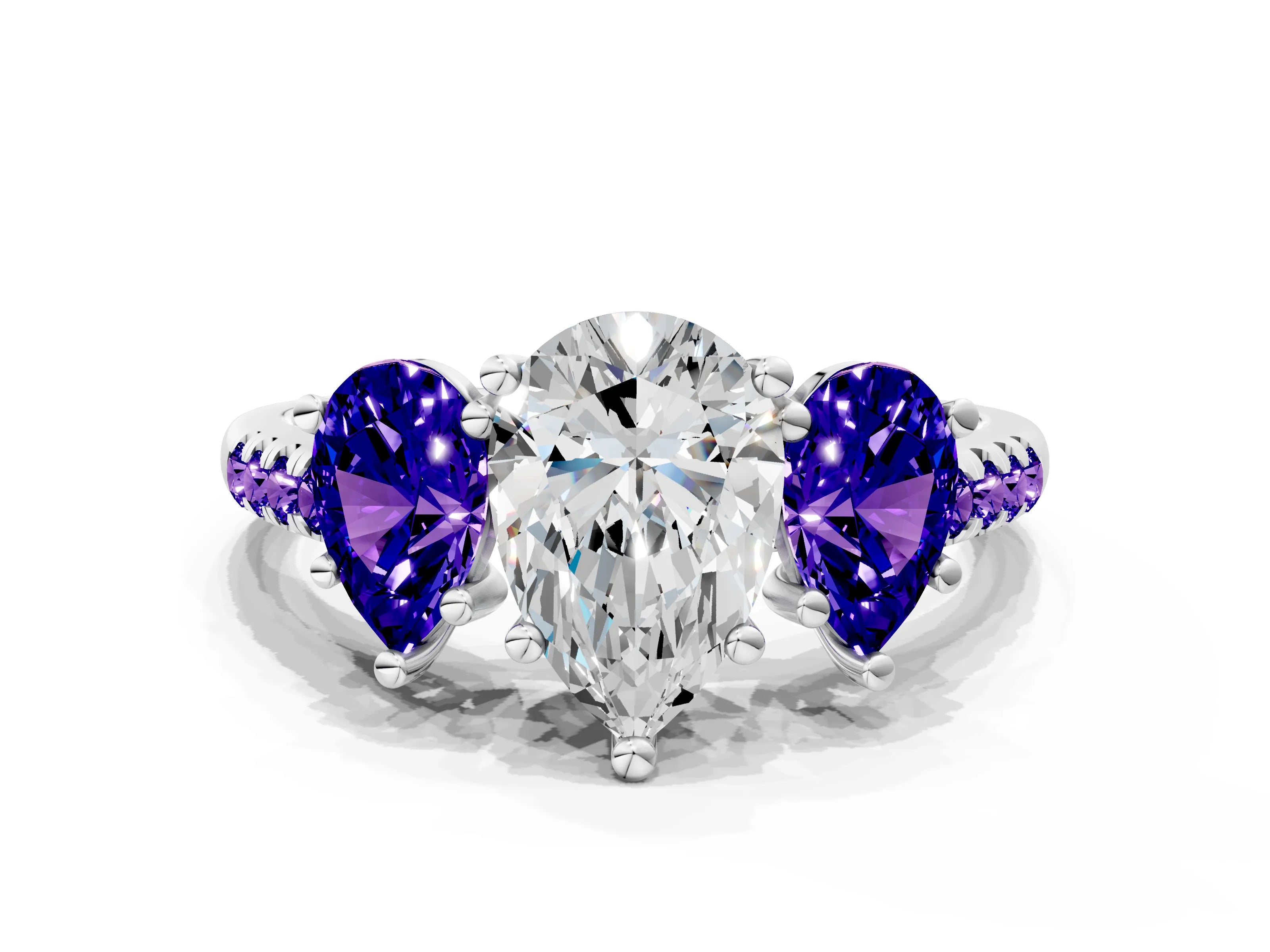 White gold Three-Stone Pear Cut Diamond Ring with Round with Tanzanite side stone Pavé Band and Prong Setting