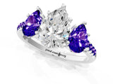 White gold Three-Stone Pear Cut Diamond Ring with Round with Tanzanite side stone Pavé Band and Prong Setting_1