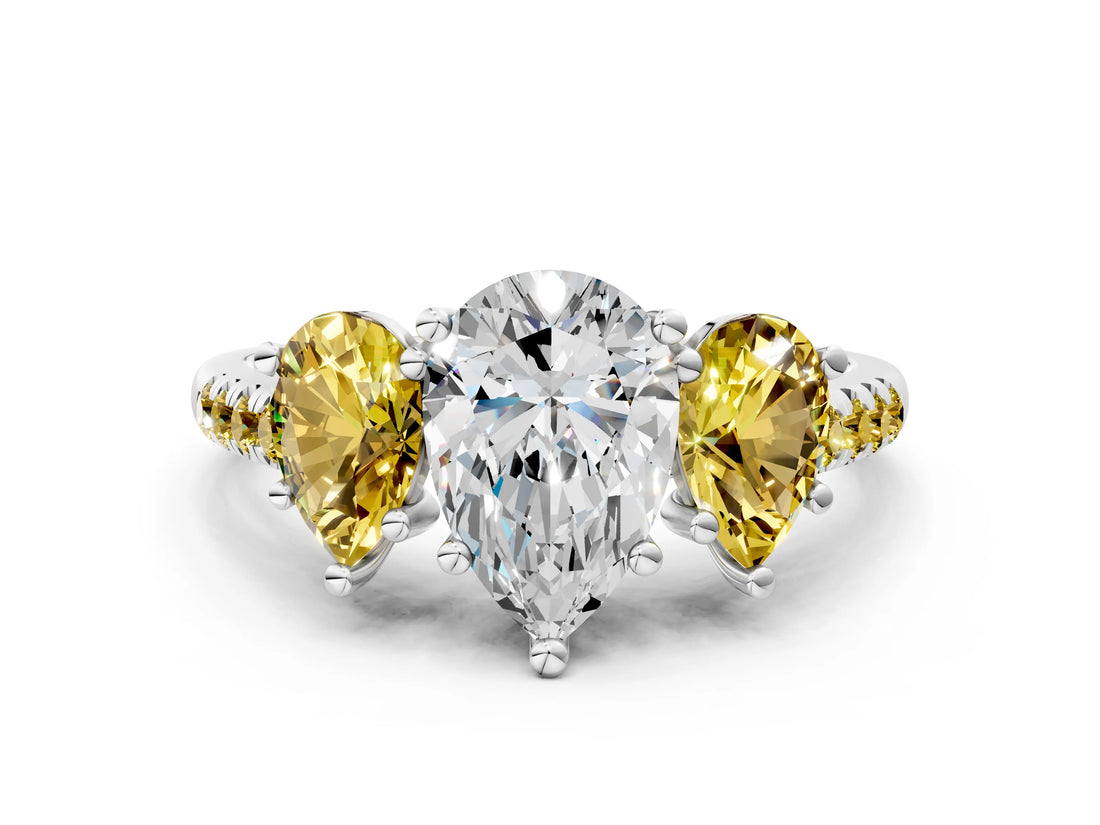 White gold Three-Stone Pear Cut Diamond Ring with Round with Yellow Sapphire side stone Pavé Band and Prong Setting
