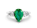 White gold Three-Stone Pear Cut Emerald Ring with Pear Side Stones and Four-Prong Setting
