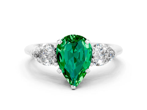 White gold Three-Stone Pear Cut Emerald Ring with Pear Side Stones and Four-Prong Setting