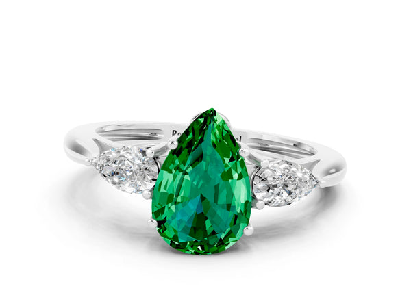 Silver Three-Stone Pear Cut Emerald Ring with Pear  Side Stones in Four-Prong Setting