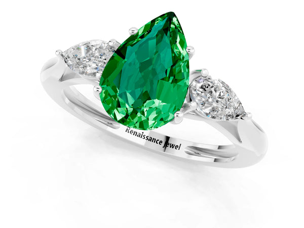 Platinum Three-Stone Pear Cut Emerald Ring with Pear  Side Stones in Four-Prong Setting