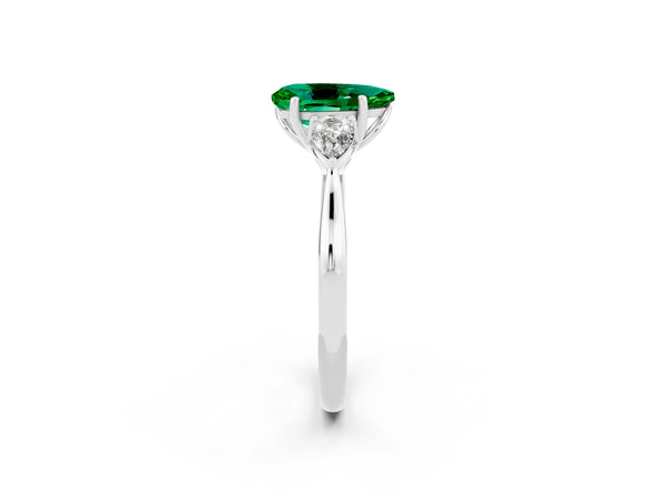 Platinum Three-Stone Pear Cut Emerald Ring with Pear  Side Stones in Four-Prong Setting