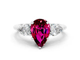 White gold Three-Stone Pear Cut Garnet Ring with Pear Side Stones and Four-Prong Setting