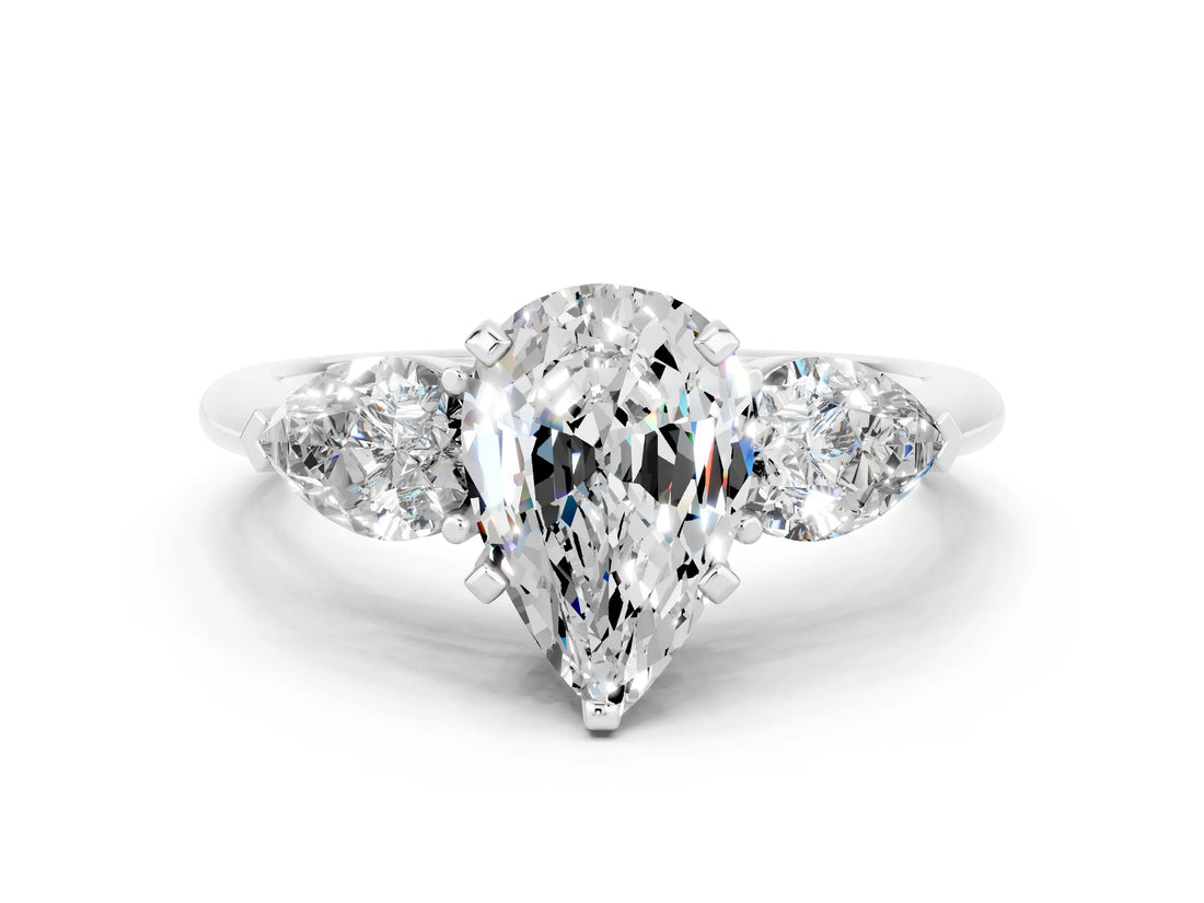 White gold Three-Stone Pear Cut Moissanite Ring with Pear Side Stones and Four-Prong Setting