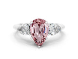 White gold Three-Stone Pear Cut Morganite Ring with Pear Side Stones and Four-Prong Setting