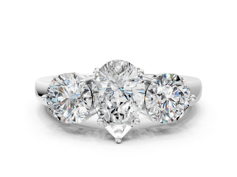 White gold Three-Stone Pear Cut Solitaire Ring with Prong Setting on a Classic Band_95