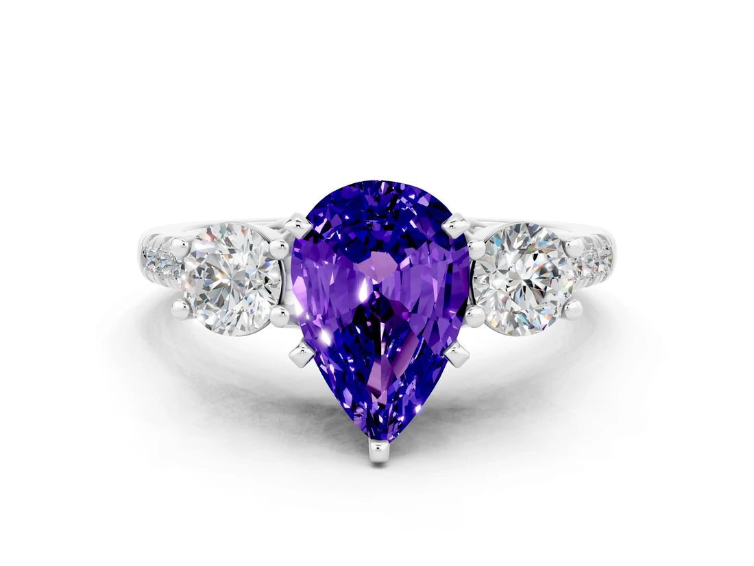 White gold Three-Stone Pear Cut Tanzanite Pavé Band with Four-Prong Setting