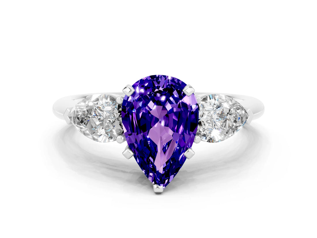 White gold Three-Stone Pear Cut Tanzanite Ring with Pear Side Stones and Four-Prong Setting