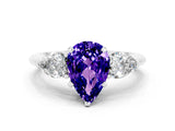 White gold Three-Stone Pear Cut Tanzanite Ring with Pear Side Stones and Four-Prong Setting