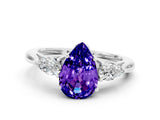 White gold Three-Stone Pear Cut Tanzanite Ring with Pear  Side Stones in Four-Prong Setting_12