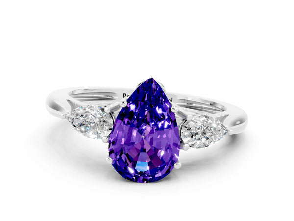 Platinum Three-Stone Pear Cut Tanzanite Ring with Pear  Side Stones in Four-Prong Setting